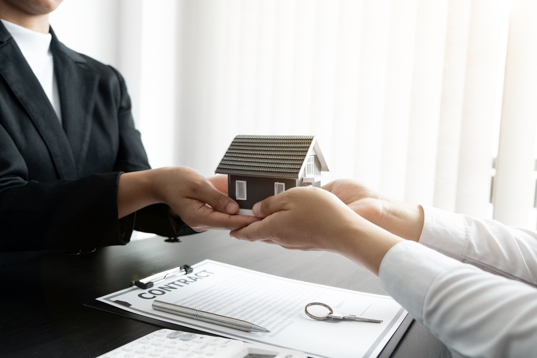 Concept of real estate, House rental contract and buying houses.